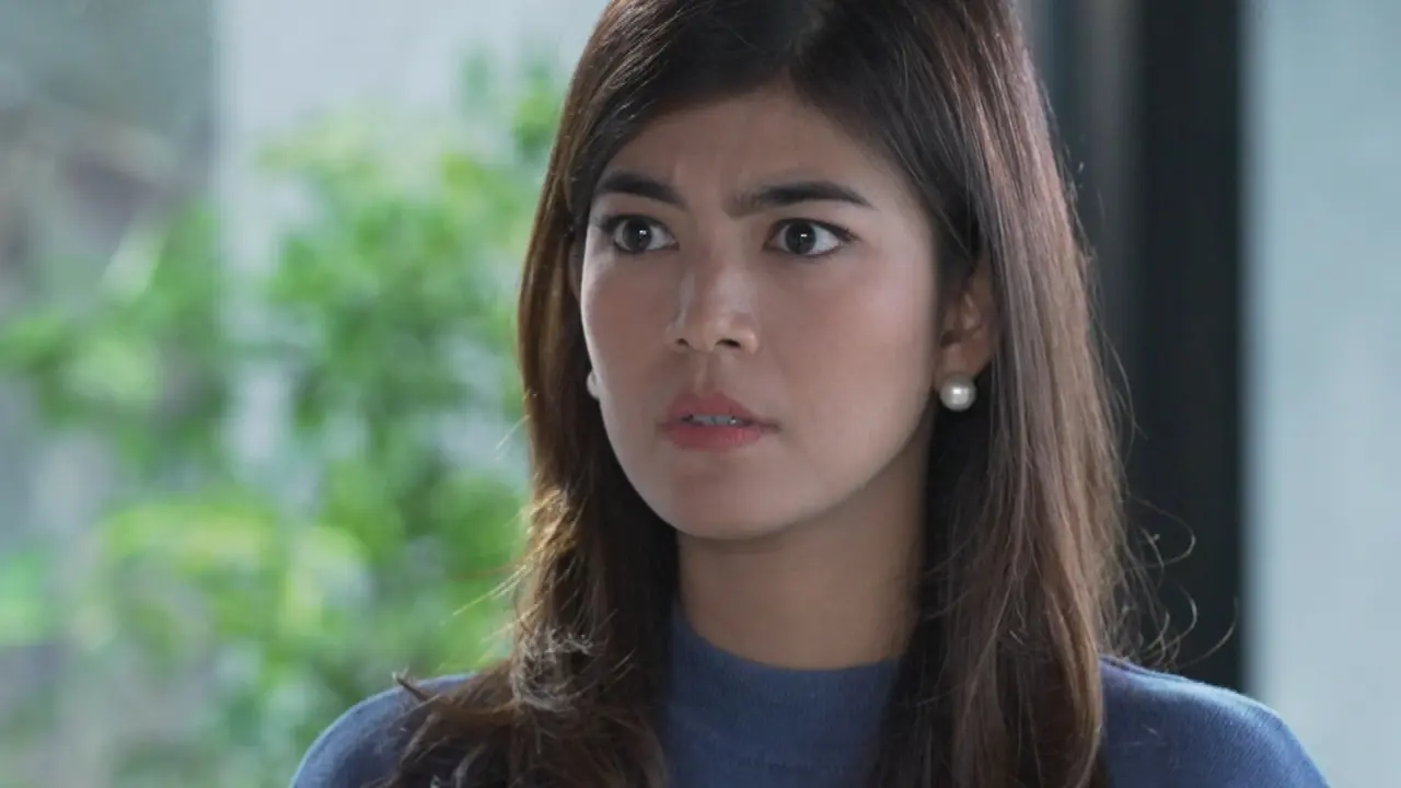 Di Antara Dua Cinta