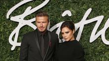 David dan Victoria Beckham di karpet merah British Fashion Awards 2014, London, Inggris. (JUSTIN TALLIS / AFP)