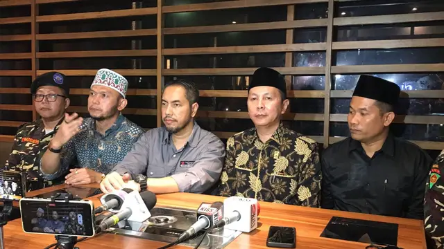 Herwanto dan Sunan Kalijaga Laporkan Richard Lee