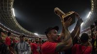 Striker Persija Jakarta, Ivan Carlos, merayakan gelar juara Piala Presiden setelah mengalahkan Bali United di SUGBK, Jakarta, Sabtu (17/2/2018). Persija menang 3-0 atas Bali United. (Bola.com/Vitalis Yogi Trisna)