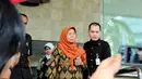Anggota DPR dari Fraksi Hanura Soemintarsih Muntoro meninggalkan Gedung KPK, Jakarta, Rabu (27/8/14). (Liputan6.com/Andrian M Tunay)