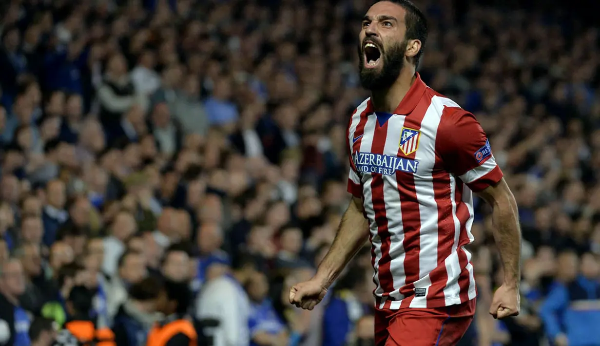 Selebrasi Arda Turan usai menjebol gawang Chelsea pada laga kedua semifinal Liga Champions di Stamford Bridge, London (1/5/2014). (REUTERS/Toby Melville)
