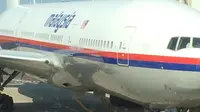 Foto pesawat Malaysia Airlines MH17 yang diunggah penumpang asal Belanda Cor Pan (Facebook.com)