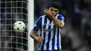 Mehdi Taremi. Tampil dalam 5 laga FC Porto di fase Grup B Liga Champions 2022/2023, striker asal Iran berusia 30 tahun ini sementara juga menempati posisi ketiga dalam daftar top skor dengan torehan 5 gol. Kelima golnya dicetak dalam tiga laga terakhir di fase grup. Ia hanya absen membela FC Porto pada matchday kedua kontra tamunya Club Brugge (13/9/2022) akibat hukuman kartu merah tak langsung yang diterimanya di matchday pertama kontra tuan rumah Atletico Madrid (7/9/2022). (AFP/Miguel Riopa)