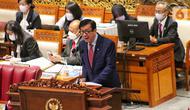 Menteri Hukum dan HAM Yasonna Laoly menyampaikan pandangan pemerintah saat rapat paripurna DPR di Jakarta, Selasa (6/12/2022). DPR RI resmi mengesahkan Rancangan Undang-Undang Kitab Undang-Undang Hukum Pidana (RUU KUHP) menjadi Undang-Undang. (Liputan6.com/Angga Yuniar)