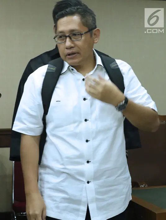 Terpidana kasus korupsi Pembangunan P3SON Hambalang, Anas Urbaningrum usai menjalani sidang lanjutan PK di Pengadilan Negeri Jakarta Pusat, Kamis (12/7). Sidang beragenda pembacaan kesimpulan pemohon Peninjauan Kembali. (Liputan6.com/Helmi Fithriansyah)