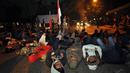 Ratusan mahasiswa berunjuk rasa di depan Kampus IISIP Jakarta untuk menolak kenaikan harga BBM, Selasa (18/11/2014) (Liputan6.com/Miftahul Hayat)