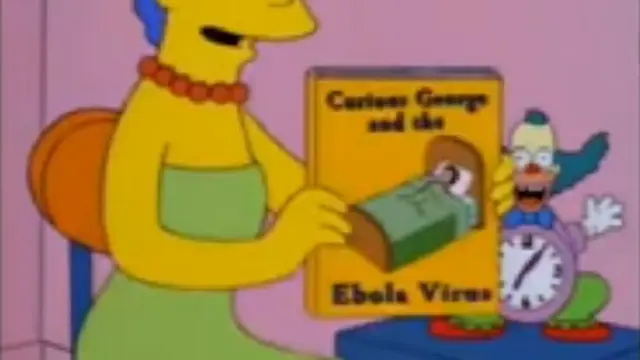 Istri Homer, yaitu Marge Simpson terlihat sedang memegang sebuah buku yang berjudul Curious George and the Ebola Virus (Capture/mental cornershop)