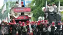 Ribuan buruh kembali melakukan aksi demonstrasi di Jalan Medan Merdeka menolak PP 78 tahun 2015 mengenai pengaturan pengupahan kerja, Jakarta, Kamis (10/12). (Liputan6.com/Yoppy Renato)