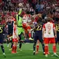 Bayern Munchen dan Real Madrid harus puas bermain imbang 2-2 pada laga leg pertama semifinal Liga Champions musim ini di Allianz Arena, Rabu (1/5/2024) dini hari WIB. (AFP/Michaela STACHE)