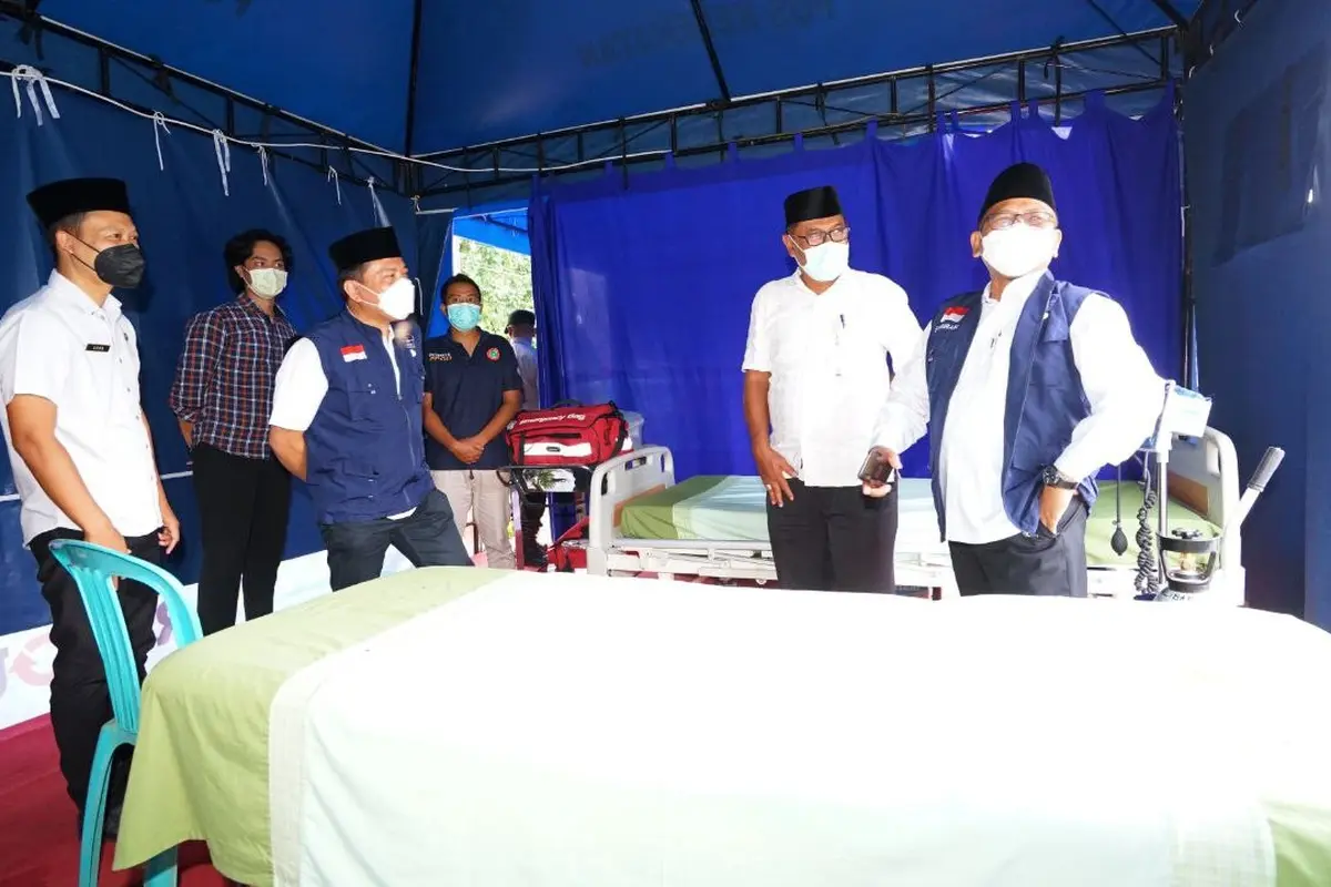 Wakil Bupati Banyuwangi Sugirah (Kiri) cek pos kesehatan mudik (Istimewa)