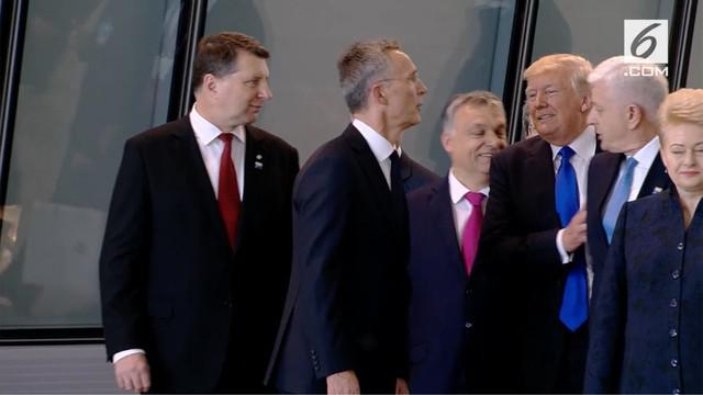 Menghadiri NATO summit, aksi Trump mendorong PM Montenegro, Dusko Markovic mencuri perhatian.