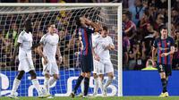 Musim lalu, Barcelona harus puas di posisi ketiga di bawah Bayern dan Benfica. Sayangnya, di Liga Europa, Barcelona juga cuma sampai babak delapan besar. (AFP/Pau Barrena)