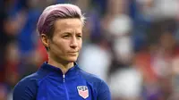 Sebelumnya Megan Rapinoe sempat menyindir Presiden Amerika Serikat, Donald Trump, yang kebijakannya merugikan kaum minoritas. (Photo by FRANCK FIFE / AFP)