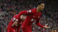 Selebrasi striker Liverpool, Cody Gakpo setelah mencetak gol ke gawang Manchester United pada laga Liga Inggris 2022/2023 di Anfield Stadium, Liverpool (5/3/2023). Baru didatangkan Liverpool pada tengah musim 2022/2023 dari PSV Eindhoven, Cody Gakpo langsung menjadi pemain Belanda tertajam di Liga Inggris musim 2022/2023 bersanding dengan Crysencio Summerville dengan mencetak 4 gol bagi The Reds dari total 9 laga. (AFP/Paul Ellis)