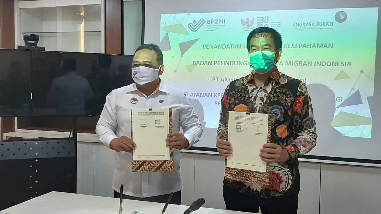 Penandatanganan nota kesepakatan antara Direktur Utama PT Angkasa Pura II, Muhammad Awaluddin, dengan Kepala BP2MI Benny Ramdani, di Terminal 3 Bandara Soekarno Hatta, Jumat (4/9/2020).