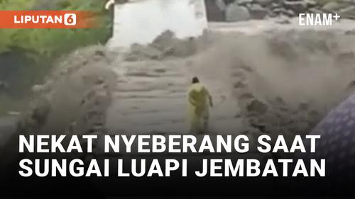 VIDEO: Warga Makassar Nekat Seberangi Jembatan yang Diluapi Air Sungai