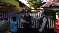 Polisi hampir putus asa mendapatkan saksi yang mengetahui kebakaran yang menimpa tujuh sekolah dasar dan sebuah SMK di Palangka Raya. (Liputan6.com/Rajana K)
