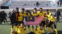 Timnas Malaysia U-23 setelah lolos ke Piala Asia U-23 2022. (Facebook FA Malaysia).