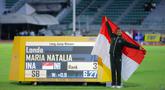 Atlet Indonesia, Maria Natalia Londa, berpose usai final lompat jauh putri SEA Games 2025 di Suphachalasai National Stadium, Pathum Wan, Bangkok, Thailand, Selasa (16/12/2025). Atlet Indonesia, Maria Natalia Londa, berhasil menambah pundi medali untuk Indonesia di SEA Games 2025 Thailand. (Bola.com/Bagaskara Lazuardi