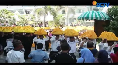 Warga Kota Banda Aceh menorehkan catatan di museum rekor dunia Indonesia dengan predikat penjunjung idang talam terbanyak.