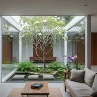 Model Rumah Modern Kaca dengan Taman Indoor Atrium