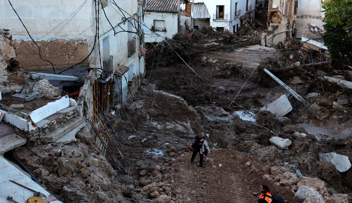 Badai hujan yang terjadi sejak Selasa hingga Rabu 29-30 Oktober 2024 menyebabkan banjir dan tanah longsor di wilayah Spanyol selatan dan timur, membentang dari Malaga hingga Valencia. (OSCAR DEL POZO/AFP)