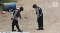 Polisi Buru Pengendara Motor Pembuang Bom Palsu di Bekasi