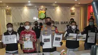 Polres Metro Jakarta Barat mengamankan terduga pelaku penipuan investasi bodong perusahaan bernama Lucky Star. (Liputan6.com/Ady Anugrahadi)