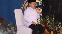 Raehan Khoiri (Rafa), anak dengan disabilitas netra yang hafal 15 juz alquran melantunkan ayat suci dalam HUT ke-78 Bhayangkara (Liputan6.com/Fira Syahrin).