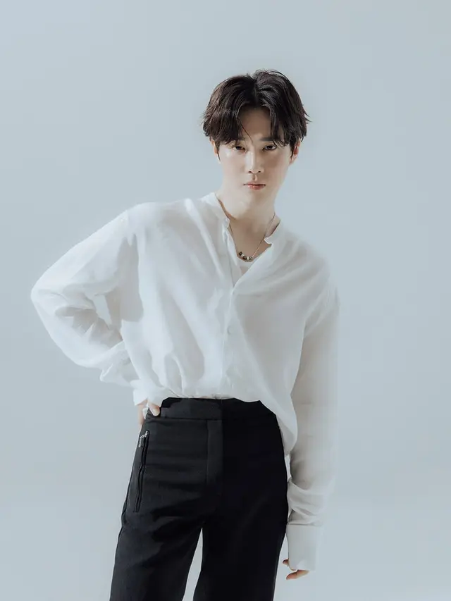 Suho EXO (SM Entertainment via Soompi)