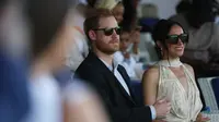 Pangeran Harry dan Meghan&nbsp;Markle&nbsp;menghadiri pertandingan polo amal di Ikoyi Polo Club di Lagos pada 12 Mei 2024 saat mengunjungi Nigeria sebagai bagian dari perayaan ulang tahun ke-10 Invictus Games. (Kola Sulaimon/AFP)