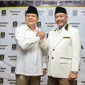 Bakal cagub dan cawagub Jawa Barat, Mayjen (Purn) Sudrajat dan Ahmad Syaikhu di kantor DPP PKS, Jakarta, Rabu (27/12). Partai Gerindra, PKS dan PAN sepakat mengusung Sudrajat dan Ahmad Syaikhu di Pilgub Jawa Barat. (Liputan6.com/Faizal Fanani)