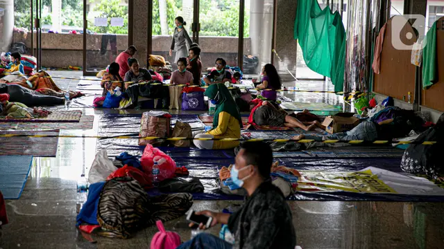 FOTO: Menengok Kondisi Pengungsi Banjir Cipinang Melayu