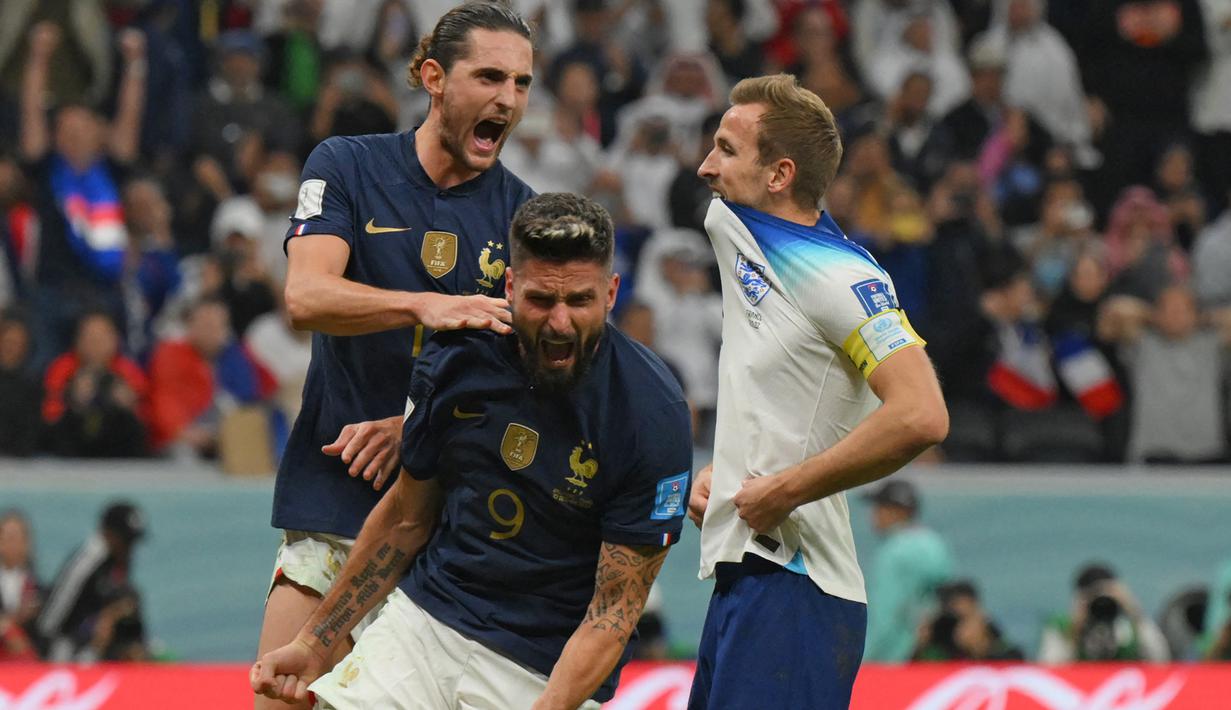 Olivier Giroud. Striker Prancis yang total mencetak 4 gol di Piala Dunia 2022 Qatar ini menjadi pemain tertua ketiga yang mampu mencetak gol pada Piala Dunia 2022 Qatar yang menjadi Piala Dunia keempatnya. Gol terakhirnya dicetak saat Prancis menang 2-1 atas Inggris pada babak perempatfinal (10/12/2022). Saat itu ia berusia 36 tahun, 2 bulan dan 10 hari. (AFP/Paul Ellis)