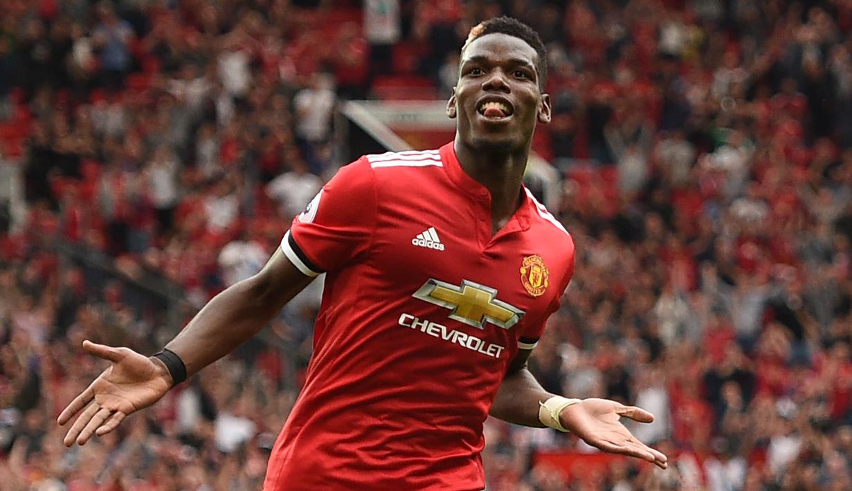 2. Paul Pogba (Manchester United) - 290.000 poundsterling per pekan. (AFP/Oli Scarff)