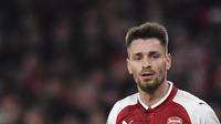 Mathieu Debuchy sempat marah kepada manajer Arsene Wenger yang menghalangi kepindahannya dari Arsenal ke Manchester United. (AFP/Stansall)