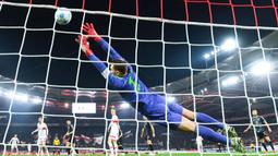 VfB Stuttgart sempat unggul terlebih dahulu melalui gol Angelo Stiller, namun Bayern Muenchen berhasil membalikkan keadaan lewat gol Michael Olise, Leon Goretzka, dan Kingsley Coman. (Tom Weller/dpa via AP)