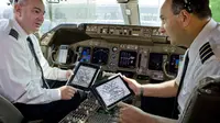 Lebih dari 74 penerbangan di American Airlines terganggu karena ada masalah di iPad
