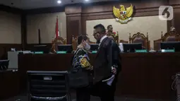 Yohan Suryanto adalah salah satu terdakwa dalam kasus dugaan korupsi pengadaan infrastruktur BTS BAKTI Kementerian Komunikasi dan Informatika (Kominfo). (Liputan6.com/Johan Tallo)