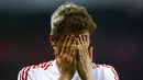 Ekspresi kekecewaan striker Bayern Munchen, Thomas Muller, usai bermain imbang melawan Leverkusen. Pada laga Bundesliga selanjutnya Munchen akan menghadapi Bochum. (Reuters/Wolfgang Rattay)