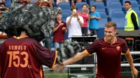 Edin Dzeko (ALBERTO PIZZOLI / AFP)