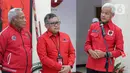 Gubernur Jawa Tengah Ganjar Pranowo bersama Sekretaris Jendral PDI Perjuangan Hasto Kristianto dan Ketua DPP PDIP Bidang Kehormatan Komarudin Watubun memberikan keterangan usai dipanggil di DPP PDIP, Jakarta, Senin (24/10/2022). Gubernur Jawa Tengah (Jateng) Ganjar Pranowo menegaskan bahwa dirinya akan taat terhadap aturan Partai PDI Perjuangan (PDIP) soal Capres 2024. (Liputan6.com/Faizal Fanani)