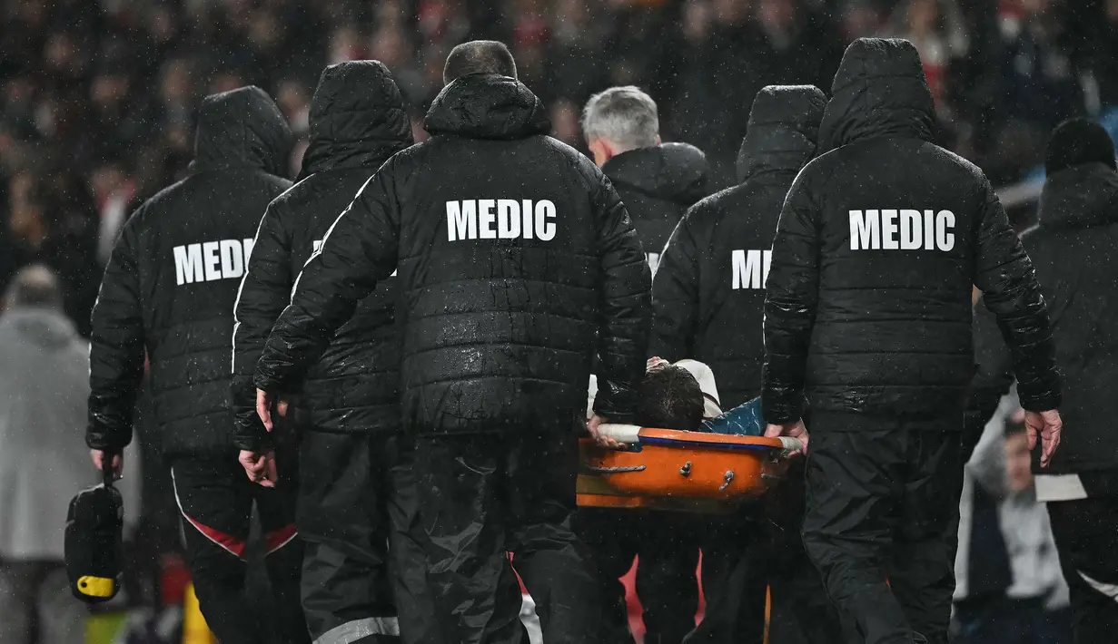 Pelatih kepala Liverpool, Arne Slot belum bisa memastikan tingkat cedera dari Conor Bradley. Hal itu disampaikan setelah laga yang berakhir imbang 0-0 tersebut. (AFP/Ben Stansall)