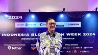 Kepala Biro Pembinaan dan Pengembangan Pasar Bappebti, Tirta Karma Senjaya dalam kegiatan Indonesia Blockchain Week 2024 di Ritz Carlton Jakarta, Selasa (19/11/2024). (Foto: Liputan6.com/Natasha K)