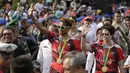 Peraih emas bulutangkis Olimpiade Rio 2016, Tontowi Ahmad dan Liliyana Natsir, saat tiba di alun-alun kota Kudus, Kamis (1/9/2016). (Bola.com/Arief Bagus)