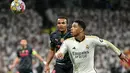 Real Madrid berbalik unggul setelah gol bunuh diri pemain Manchester City, Ruben Dias pada menit ke-12 dan gol yang dicetak Rodrygo pada menit ke-14. (JAVIER SORIANO/AFP)