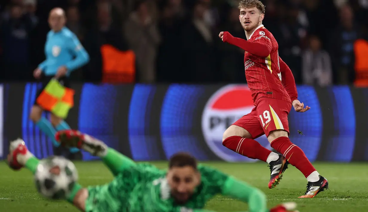 Pada menit ke-87, Liverpool membuka keunggulan lewat sebuah serangan balik cepat diakhiri dengan tendangan Harvey Elliott yang berhasil mengecoh penjaga gawang PSG, Gianluigi Donnarumma. (FRANCK FIFE/AFP)
