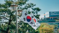 Ilustrasi bendera negara Korea Selatan. (Photo by Daniel Bernard on Unsplash)