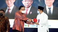Pemkot Pasuruan menerima penghargaan Merdeka Award 2022. (Foto: Merdeka.com)